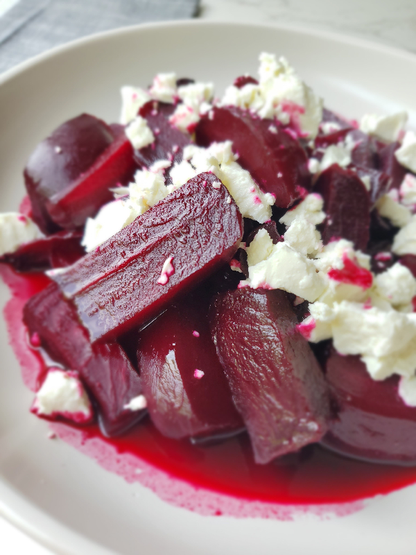 cooked red beets with crumbled goat cheese