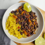 tender black beans served over a bed of rice