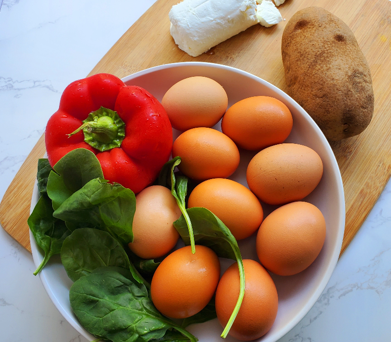 fresh ingredients like eggs and bell pepper for frittata