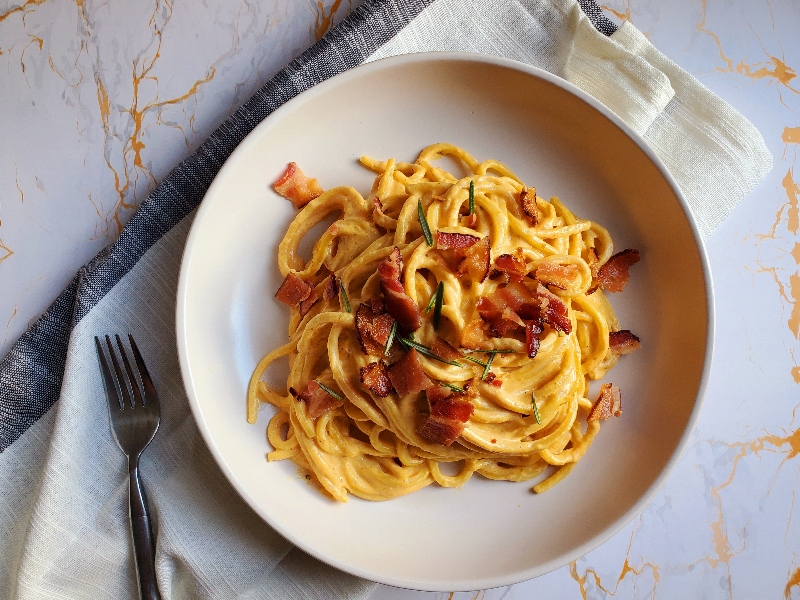 pumpkin goat cheese alfredo topped with bacon and rosemary