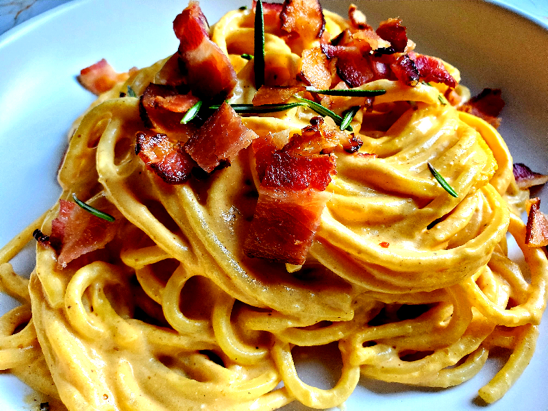 pumpkin goat cheese alfredo topped with bacon and rosemary