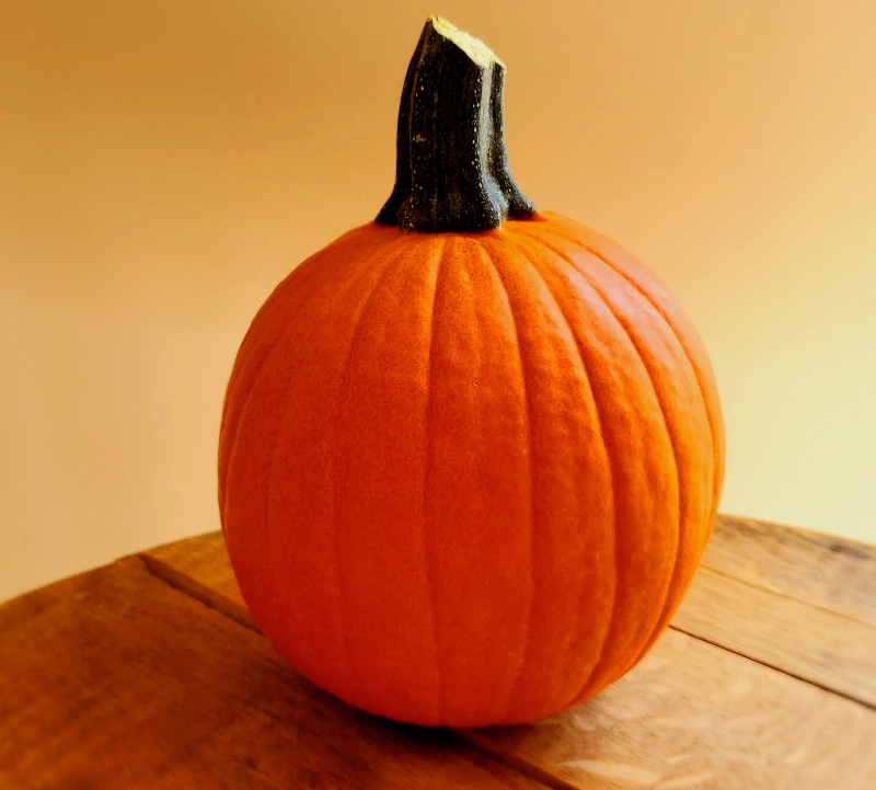 a whole pumpkin sitting on a table