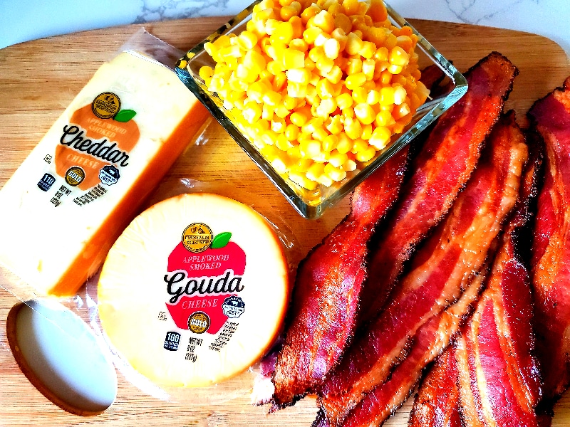 Smoked cheeses, corn, and bacon await to be added to mac n' cheese