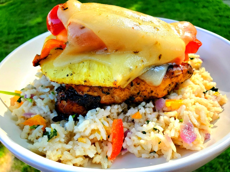 tropical grilled chicken on a bed of rice